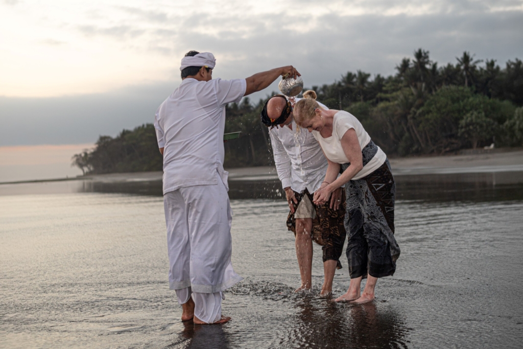 Traditional Balinese purification ritual performed by the sea at Kelapa Retreat and Spa, West Bali